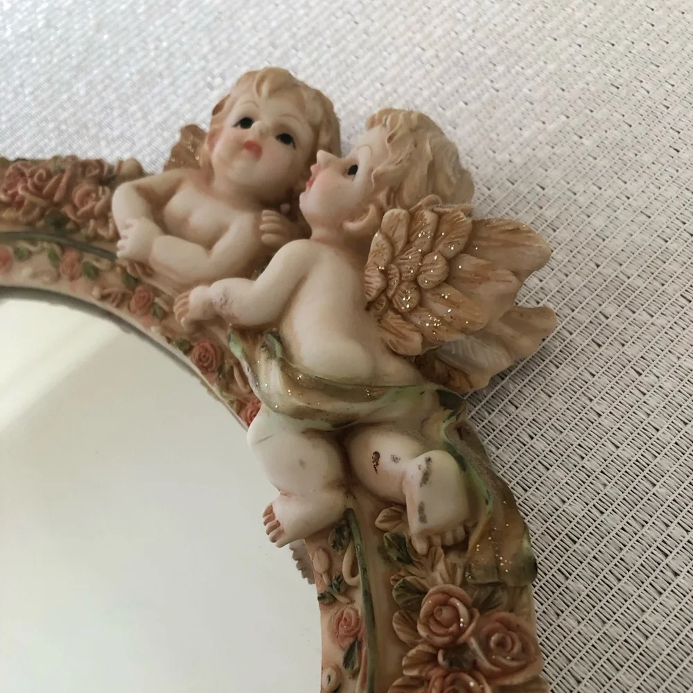 Angel-Themed Wall Mirror with Floral Accents